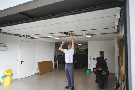 man checking his garage door