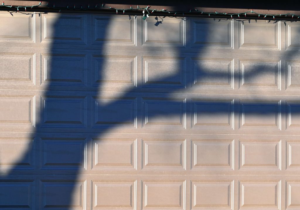 garage with tree shadow
