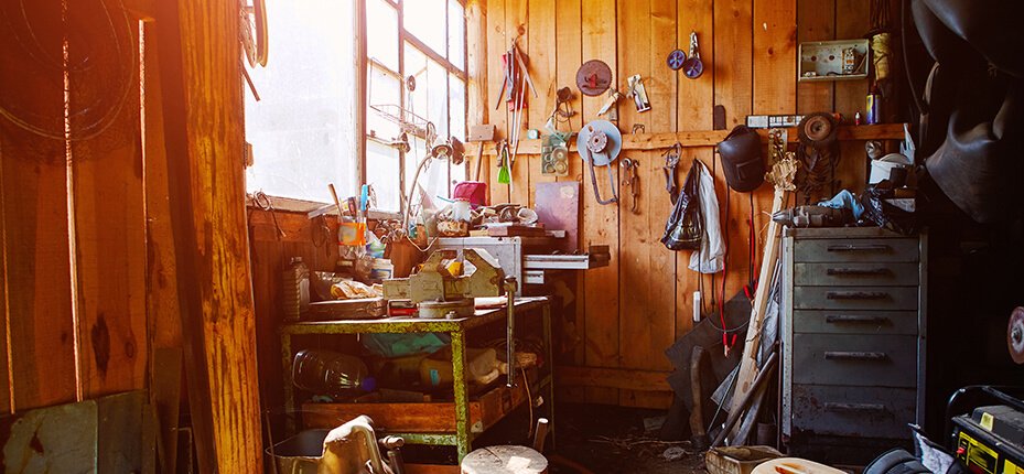 garage with sunlight peaking in with several items hung on the walls